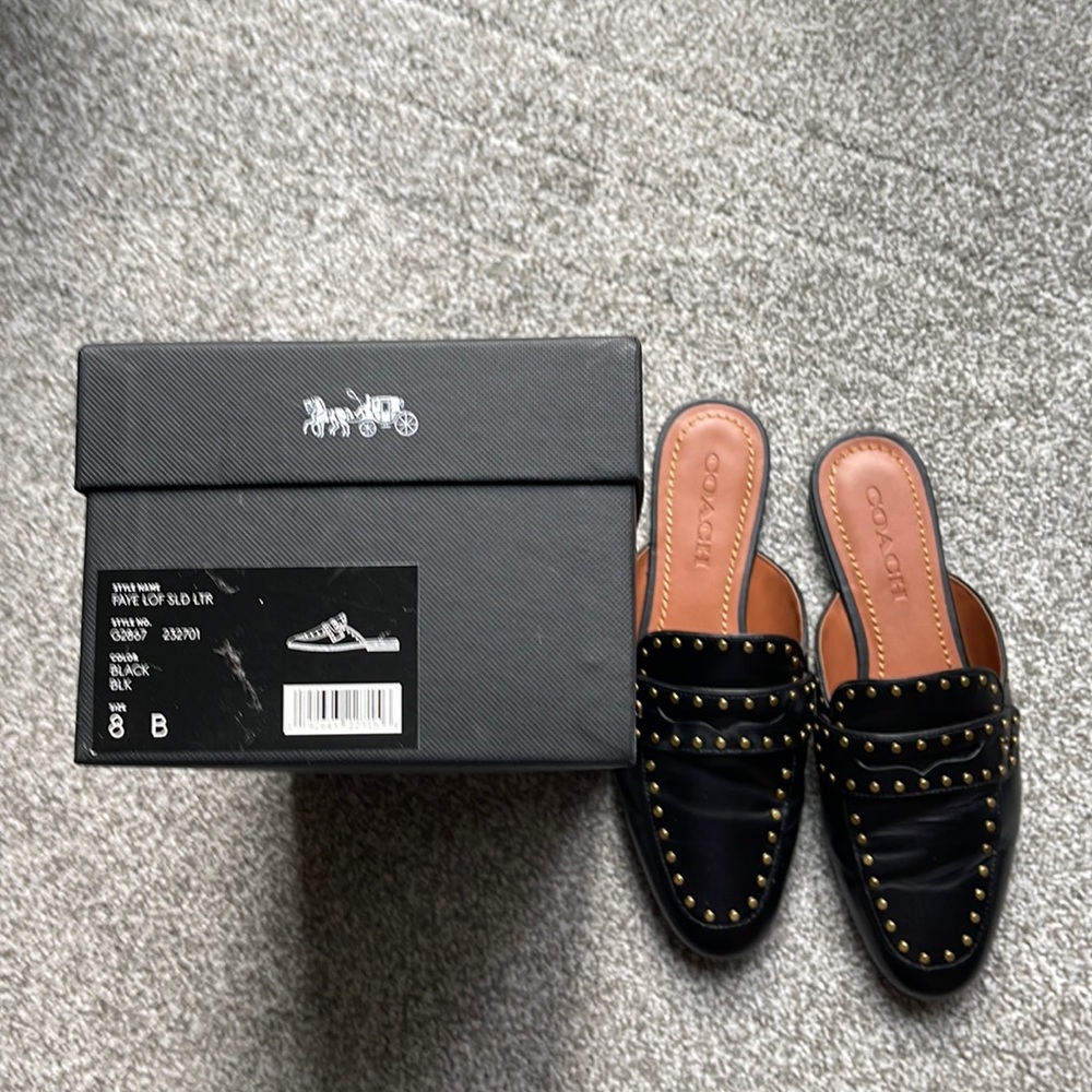 Coach loafer mule in black leather with gold rivets